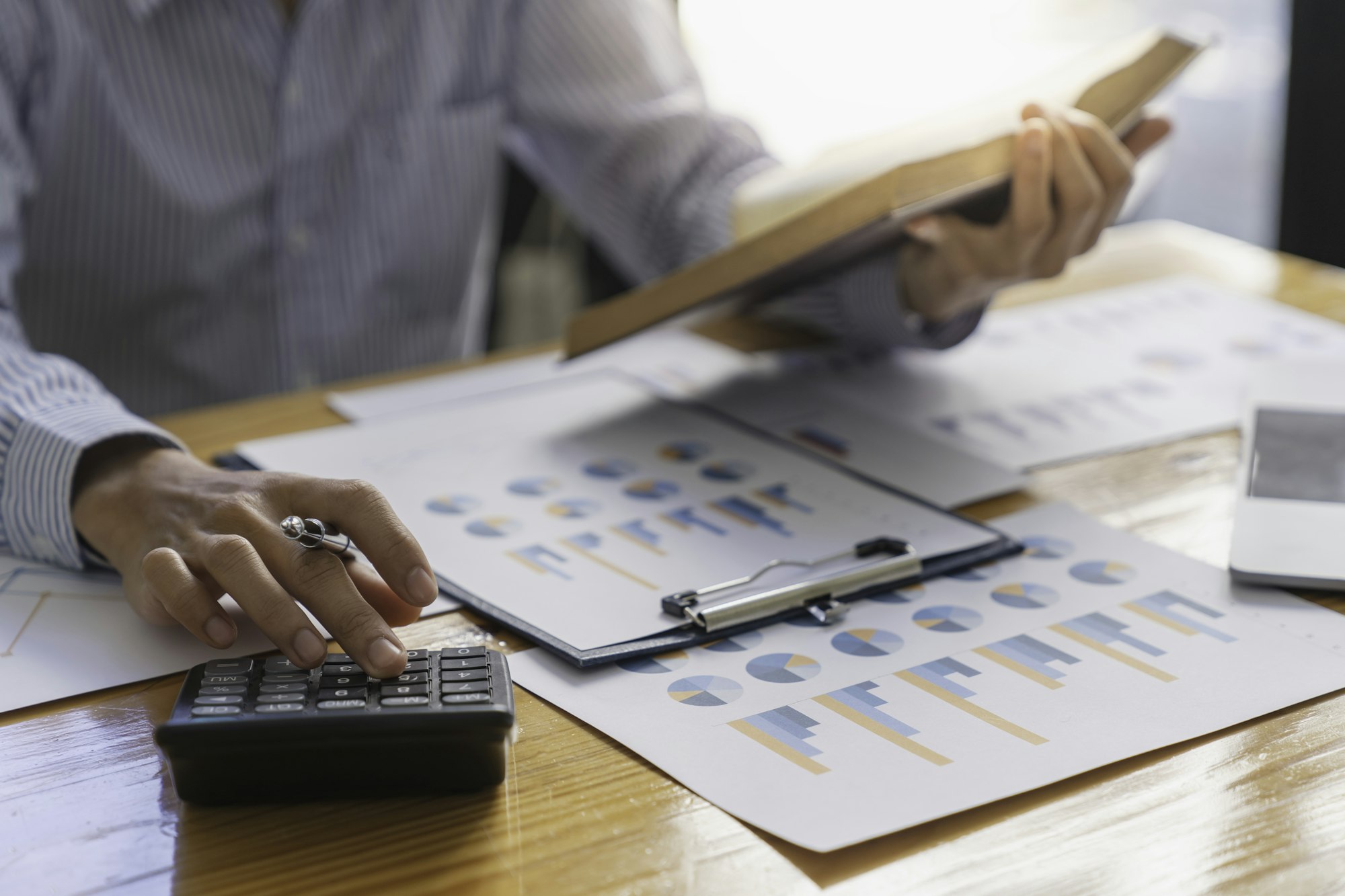 Business analyst team checking in financial statement for audit internal control system. Accounting